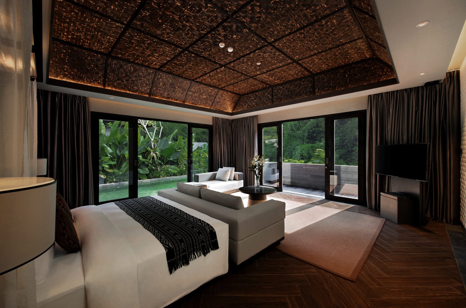Interior view of SARAS Room at Ayatara Villa Ubud Kintamani Bali – a luxury villa di Bali with private pool and jungle view for honeymooners and discerning travelers. Luxurious bedroom in villa in Bali.