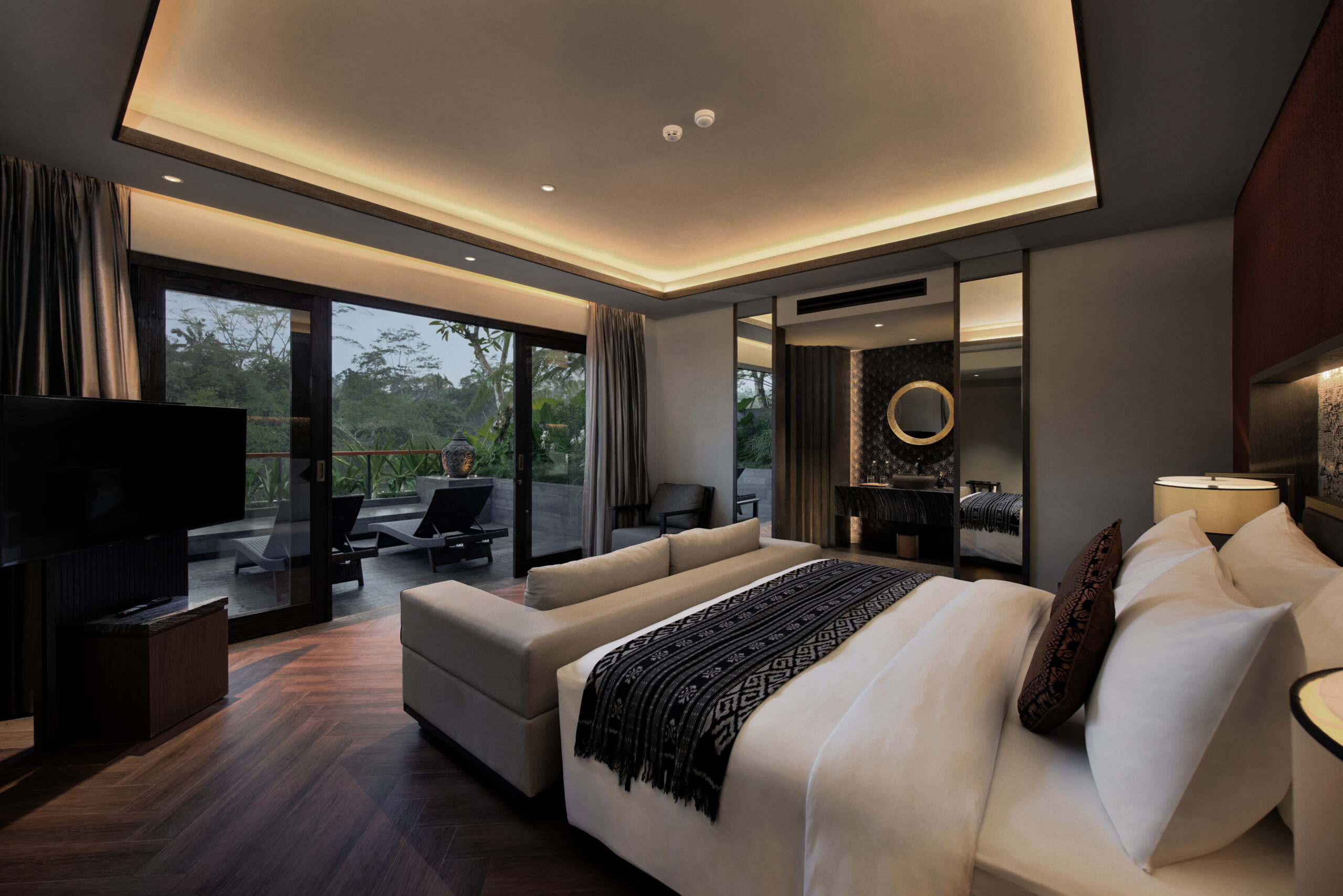 AYATARA VILLA Akash Forest-View Balcony Suites at this Bali villa offer a serene escape with breathtaking jungle views from a private balcony. Perfect for a villa in Bali experience surrounded by nature.