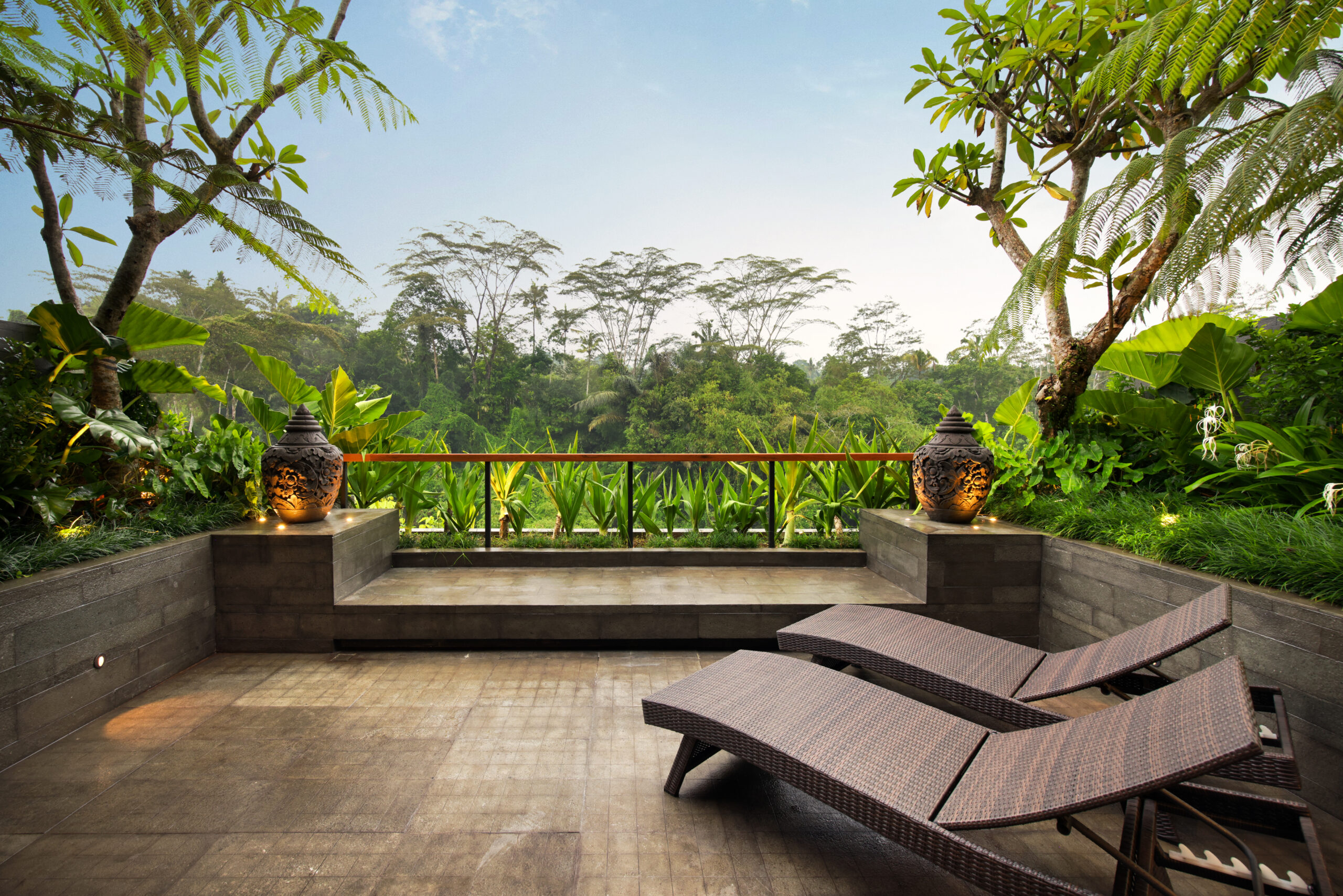 AYATARA VILLA Akash Forest-View Balcony Suites at this Bali villa offer a serene escape with breathtaking jungle views from a private balcony. Perfect for a villa in Bali experience surrounded by nature.